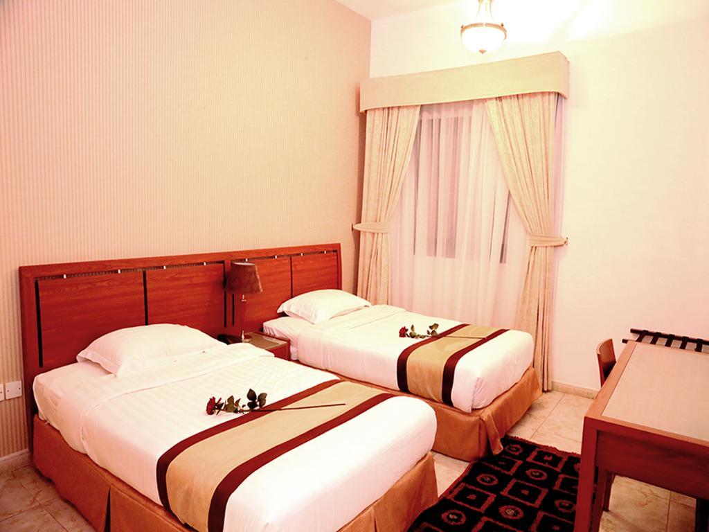 Arcadia Hotel Suites Schardscha Zimmer foto
